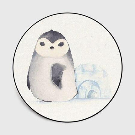 Okrągły biały dywan z małym pingwinem