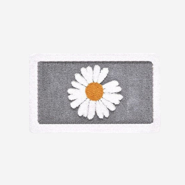 Chłonny dywanik łazienkowy w stokrotki