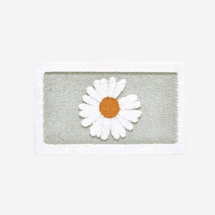 Chłonny dywanik łazienkowy w stokrotki