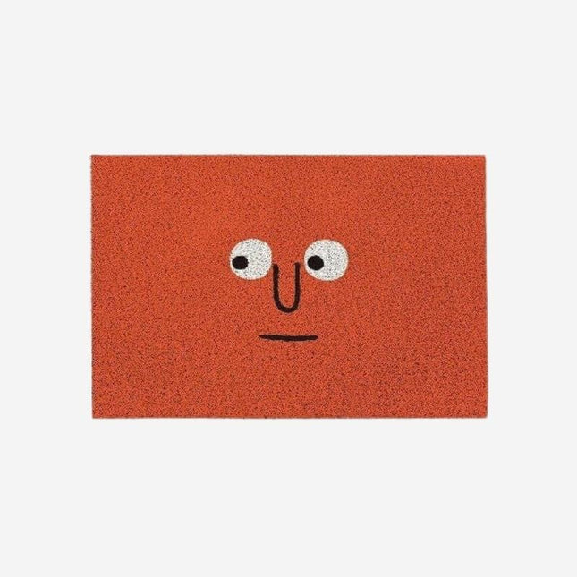 Czerwona oryginalna wycieraczka z twarzą