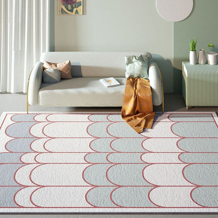 Nowoczesny dywan w łuki niebiesko-biały