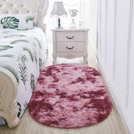 Owalny puszysty dywanik shaggy fioletowy