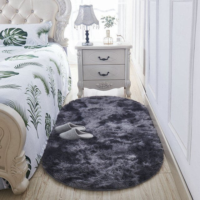 Owalny puszysty dywanik shaggy ciemnoszary