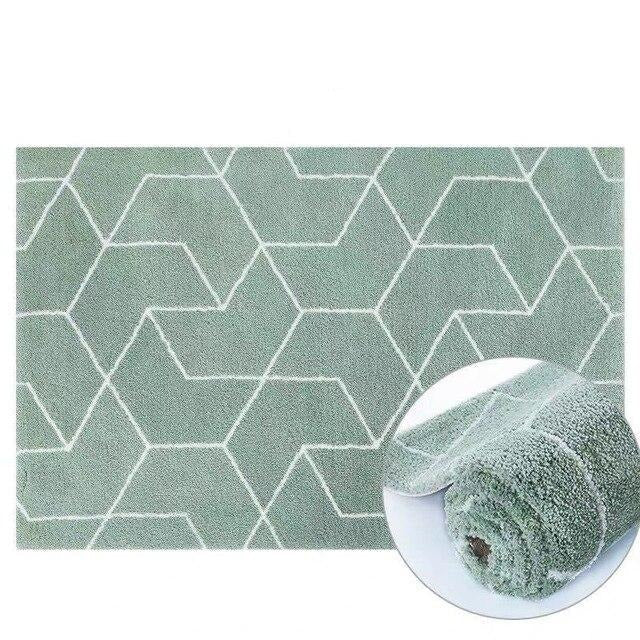 Miętowy dywan shaggy w geometryczne wzory