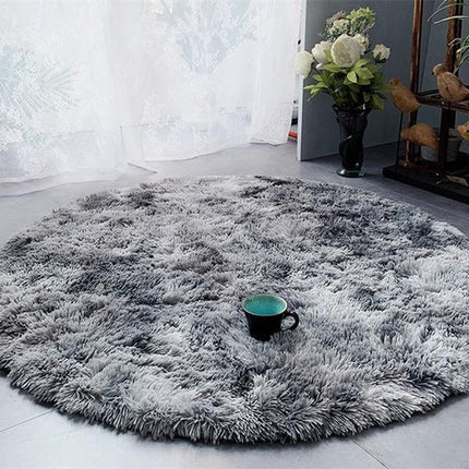 Okrągły puszysty dywan shaggy jasnoszary