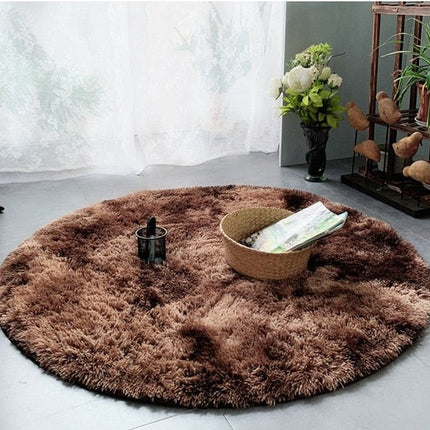 Okrągły puszysty dywan shaggy brązowy