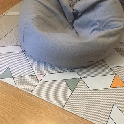 Żółty dywan w geometryczne wzory