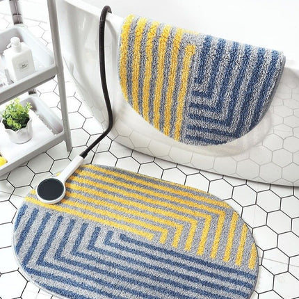 Żółto-niebieski dywanik łazienkowy geometryczny