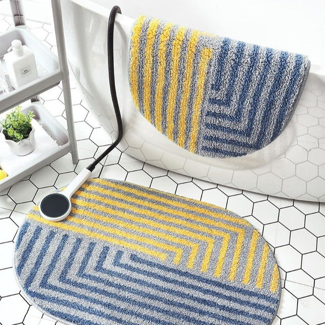 Żółto-niebieski dywanik łazienkowy geometryczny