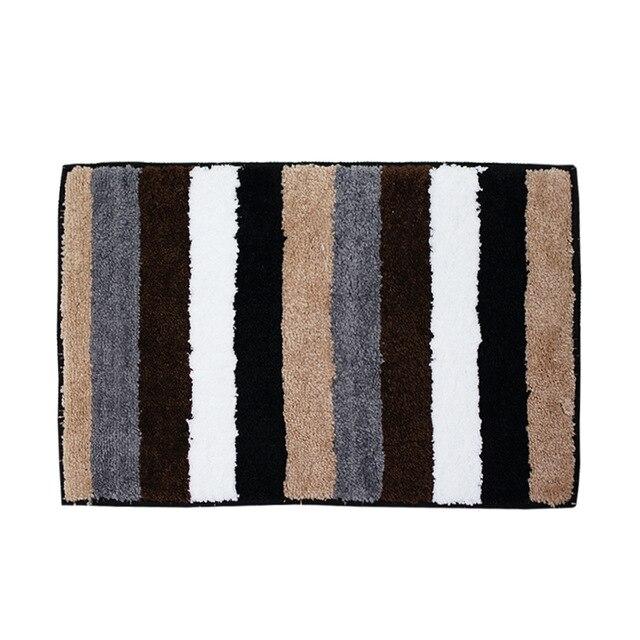 Dywanik łazienkowy w brązowe pasy
