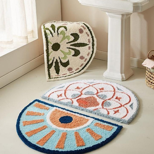 Półokrągły dywanik łazienkowy ze słońcem