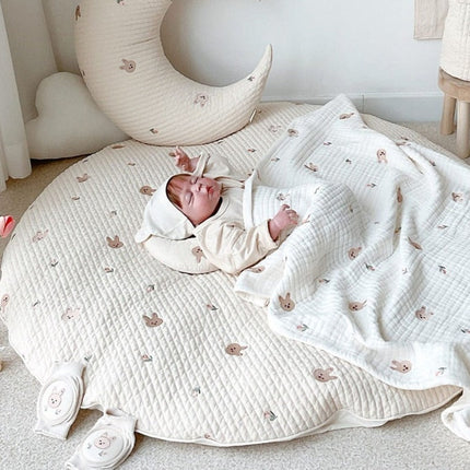 Okrągła mata do zabawy dla niemowlaka