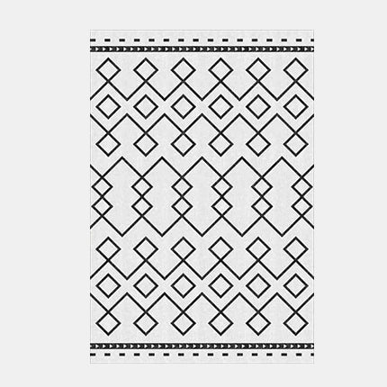 Czarno-biały dywan skandynawski w geometryczne wzory