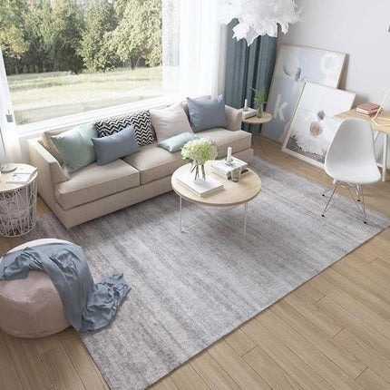 Gładki jasnoszary dywan do sypialni