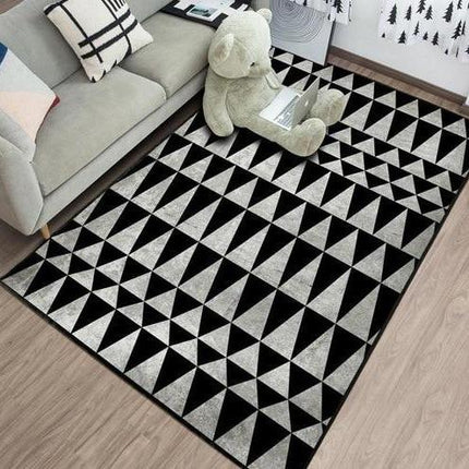 Czarno-biały dywan winylowy w trójkąty